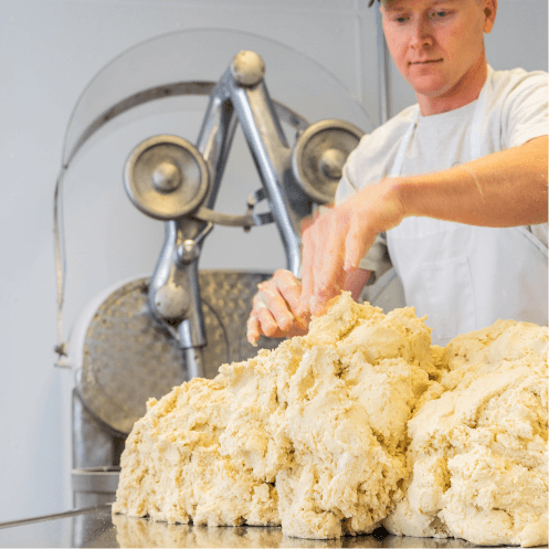 Man kneading dough